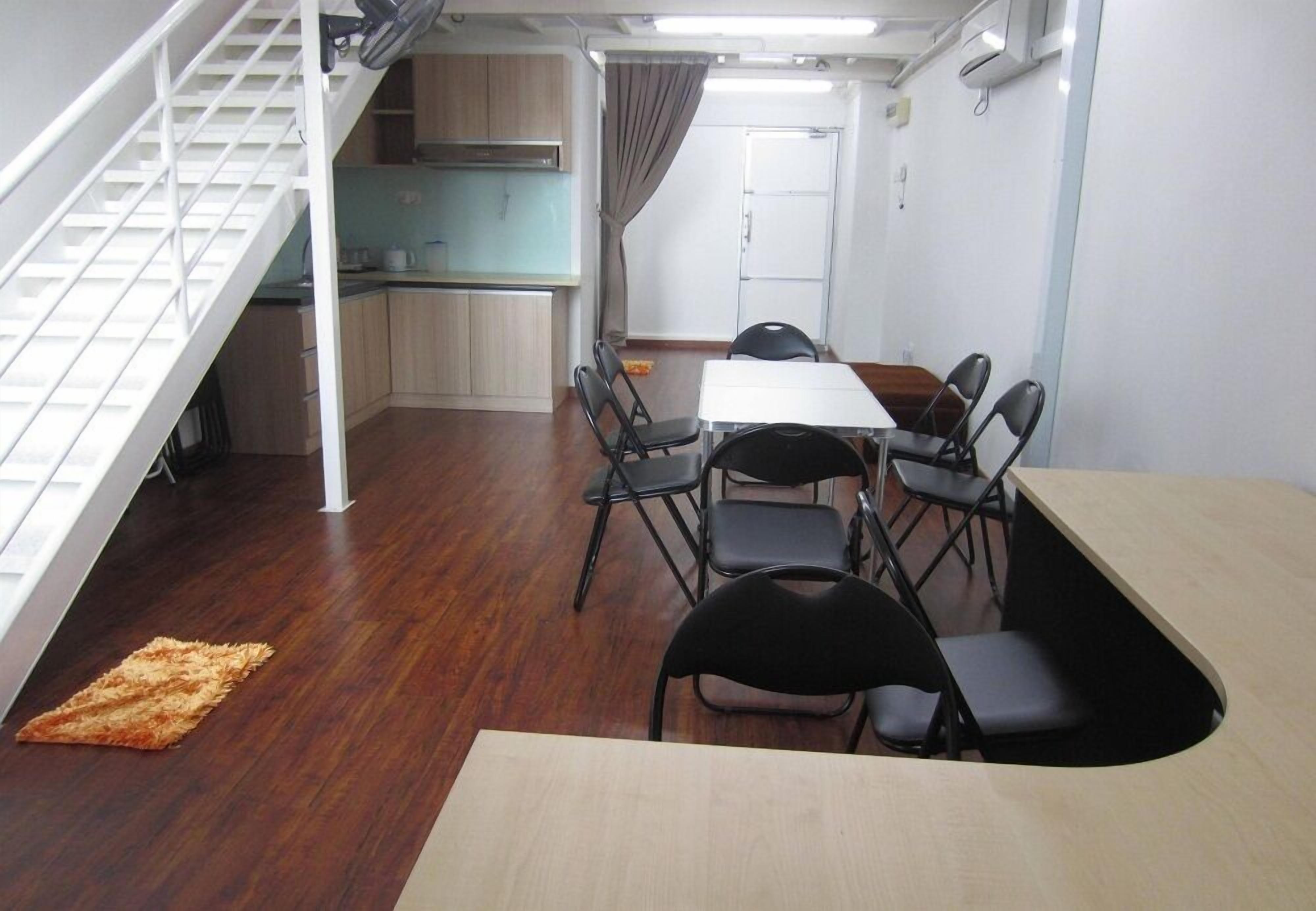 guest house family suite @ the ceo | desk, soundproofing, iron/ironing board