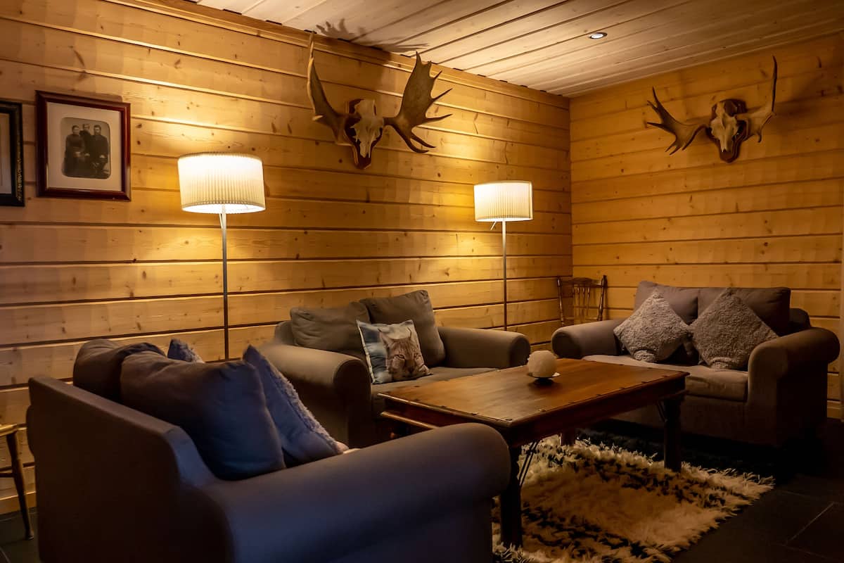 apartment suite | living area | 32-inch flat-screen tv with cable channels, tv, ping pong