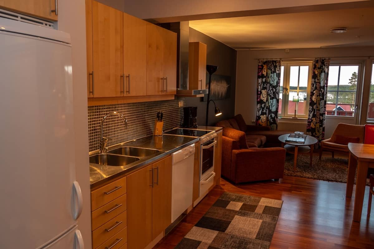 eight-bed apartment | private kitchen | dining tables