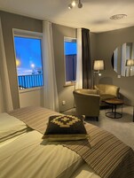 Blackout drapes, soundproofing, iron/ironing board, cribs/infant beds