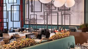 Breakfast, lunch, dinner served; international cuisine, garden views