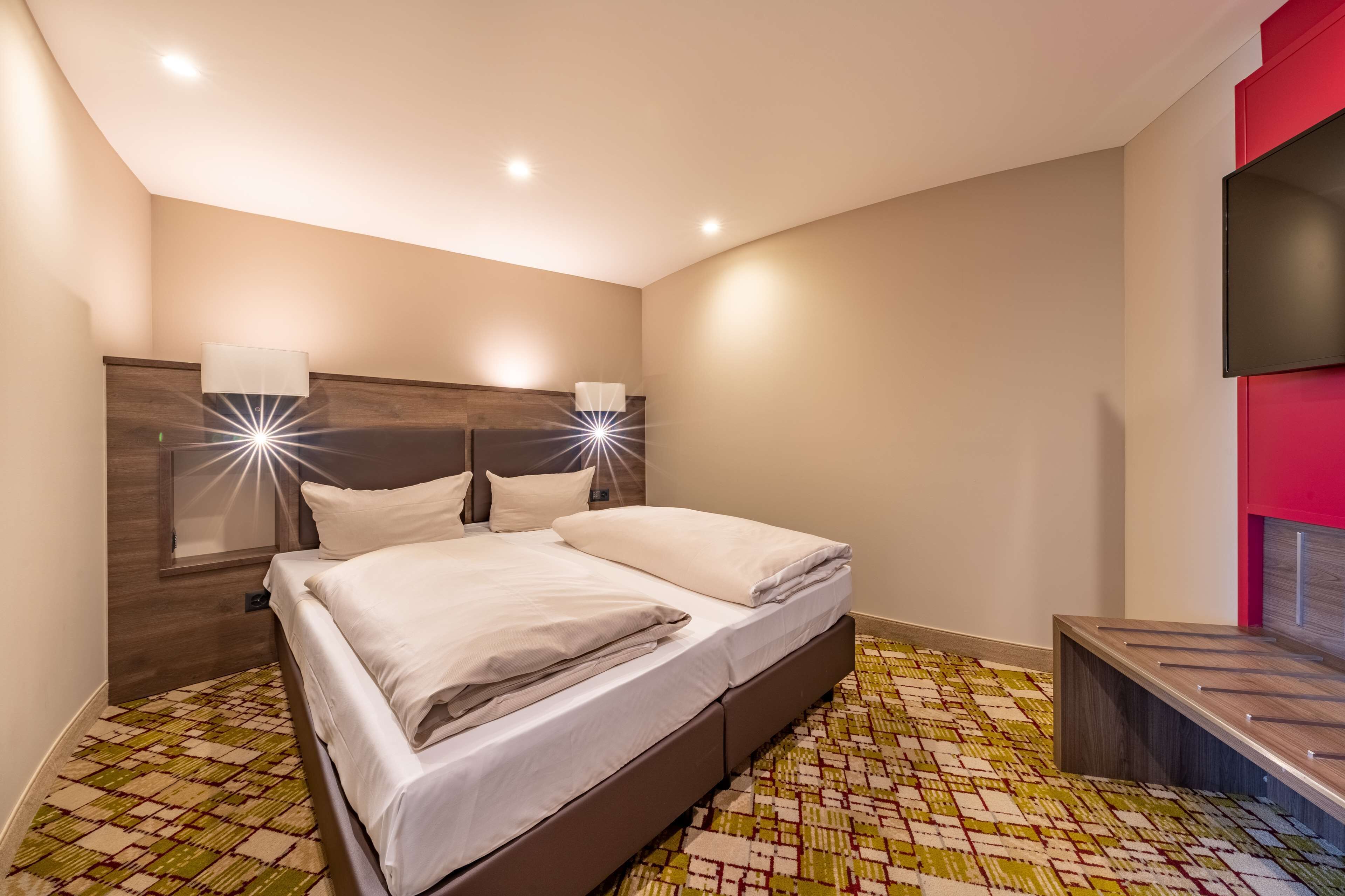 In-room safe, desk, cribs (free), rollaway beds (surcharge)