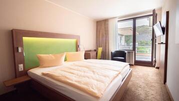 Ropa de cama de alta calidad, minibar y escritorio