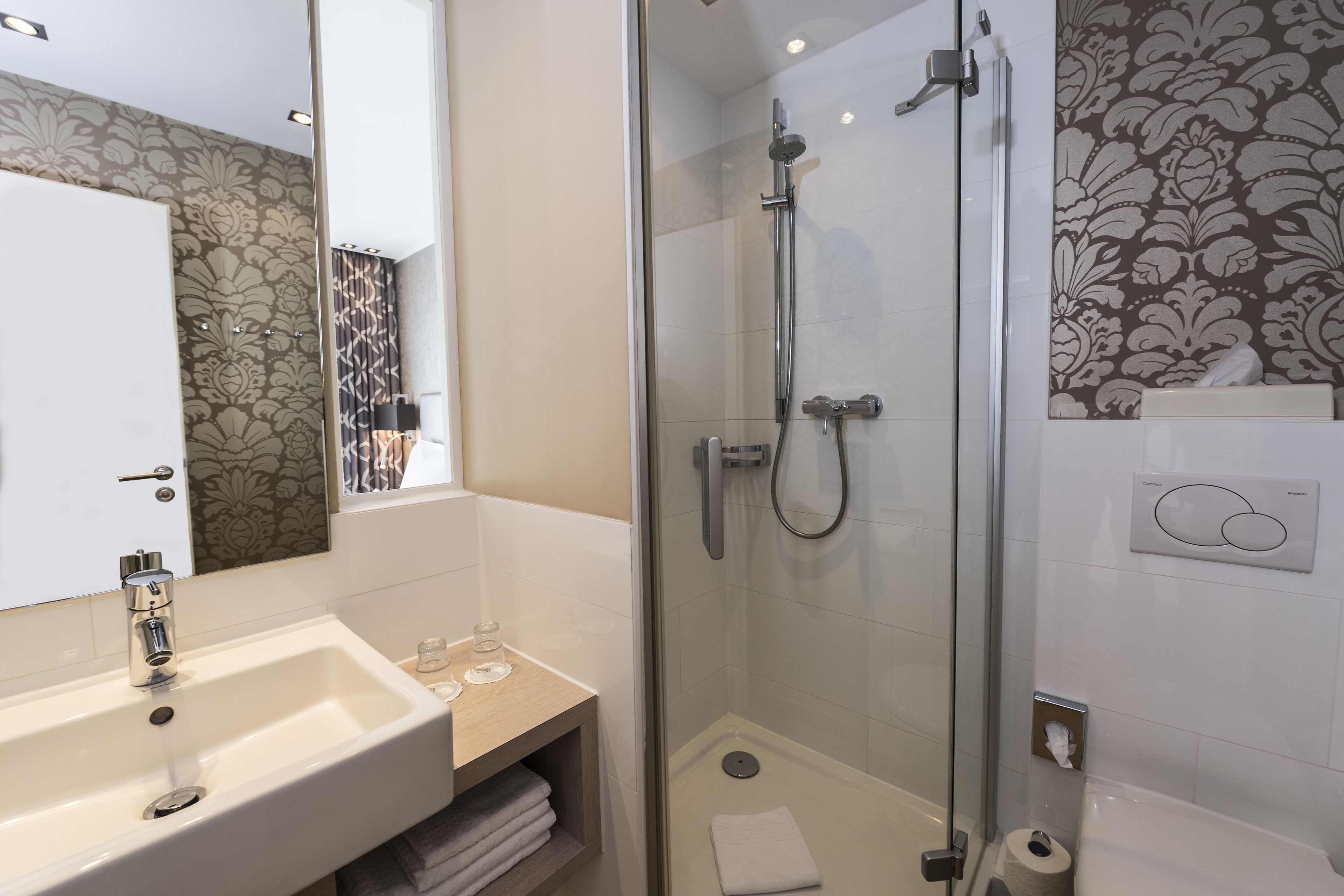 shower, free toiletries, hair dryer, towels