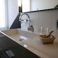 Shower, designer toiletries, hair dryer, towels