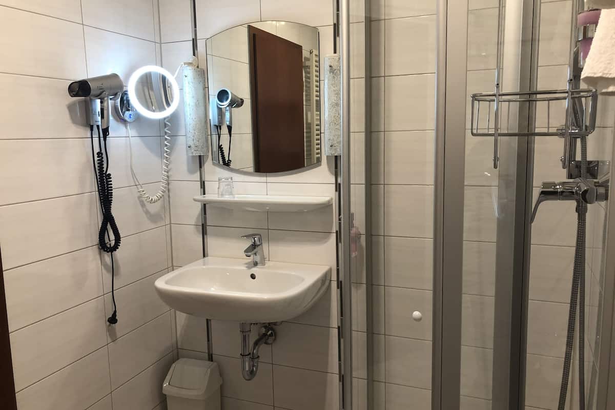 family double room | bathroom | hair dryer, towels