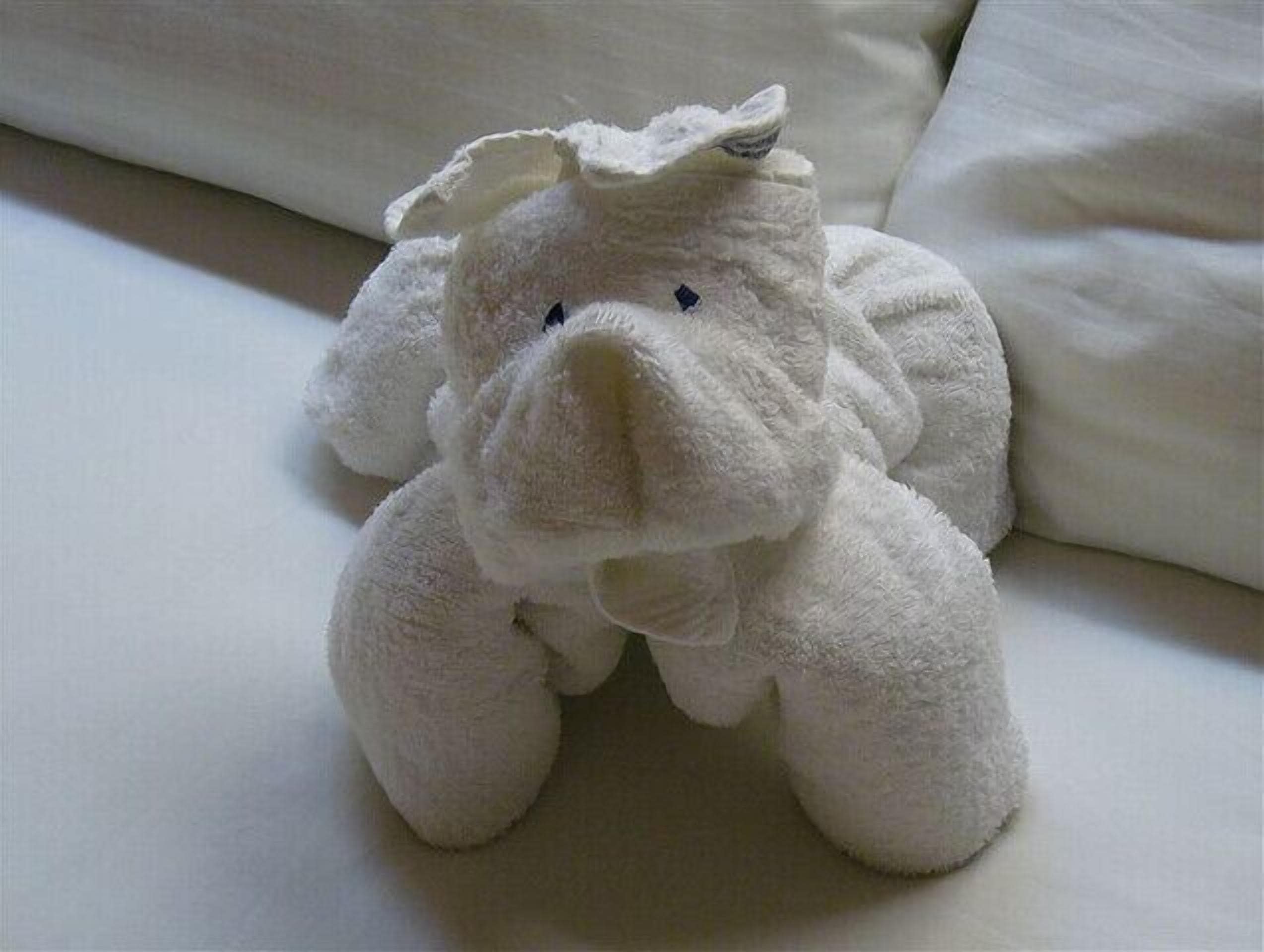A plush toy on a bed.