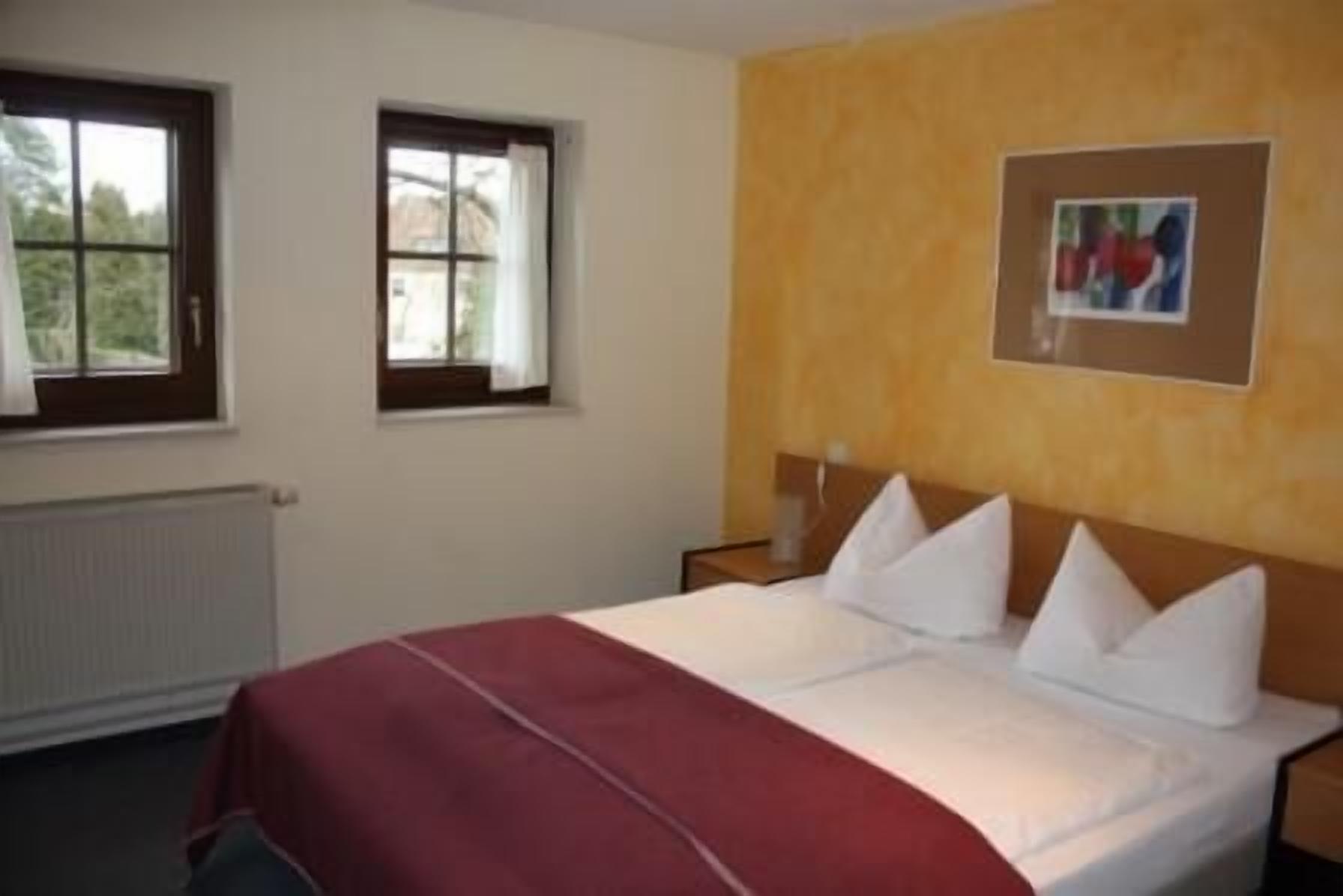 comfort double room | living area | flat-screen tv