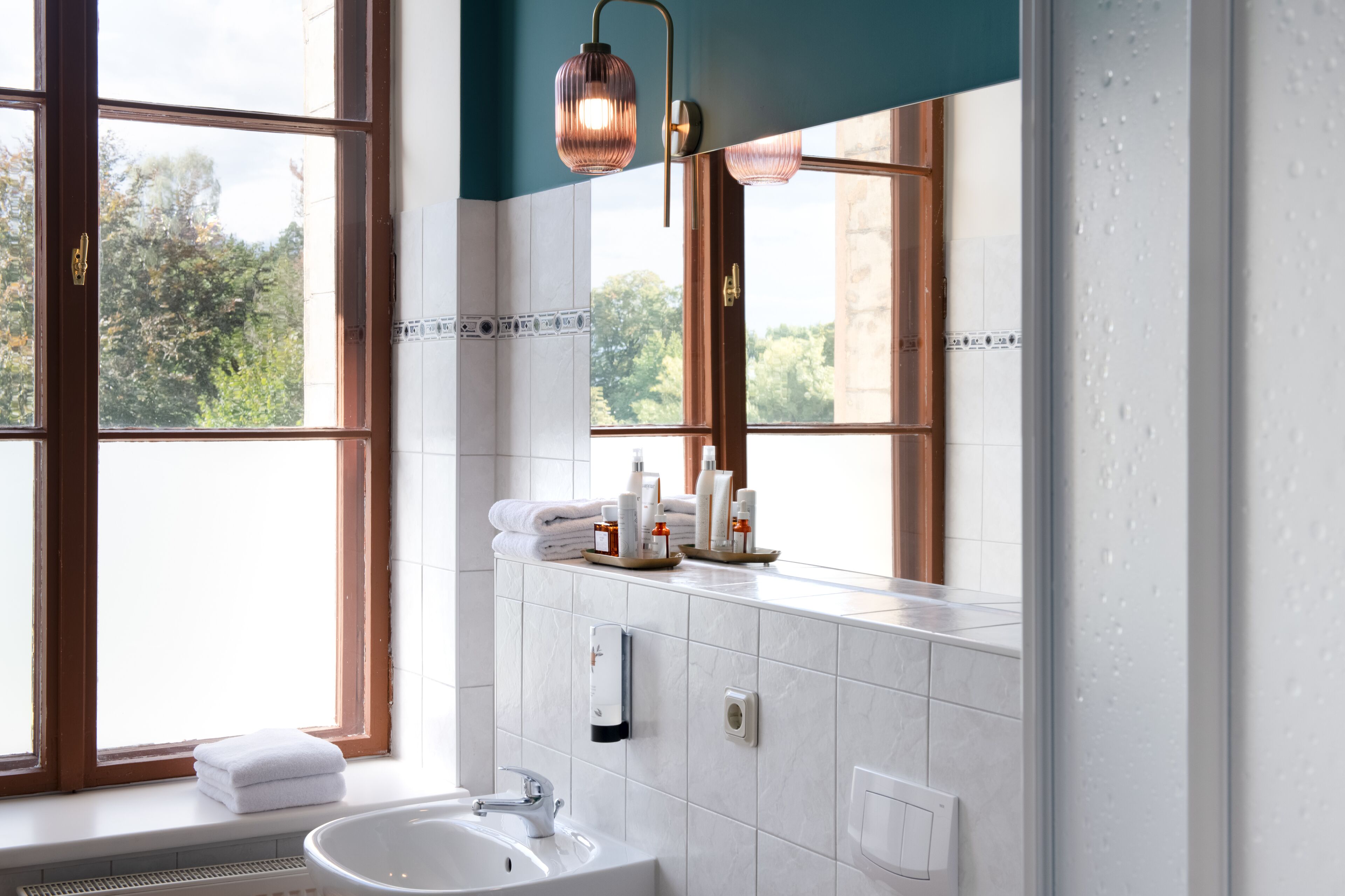 shower, eco-friendly toiletries, hair dryer, towels