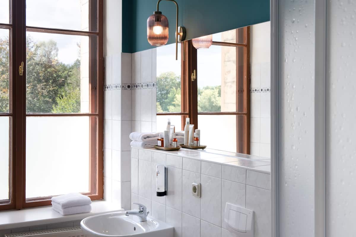 shower, eco-friendly toiletries, hair dryer, towels