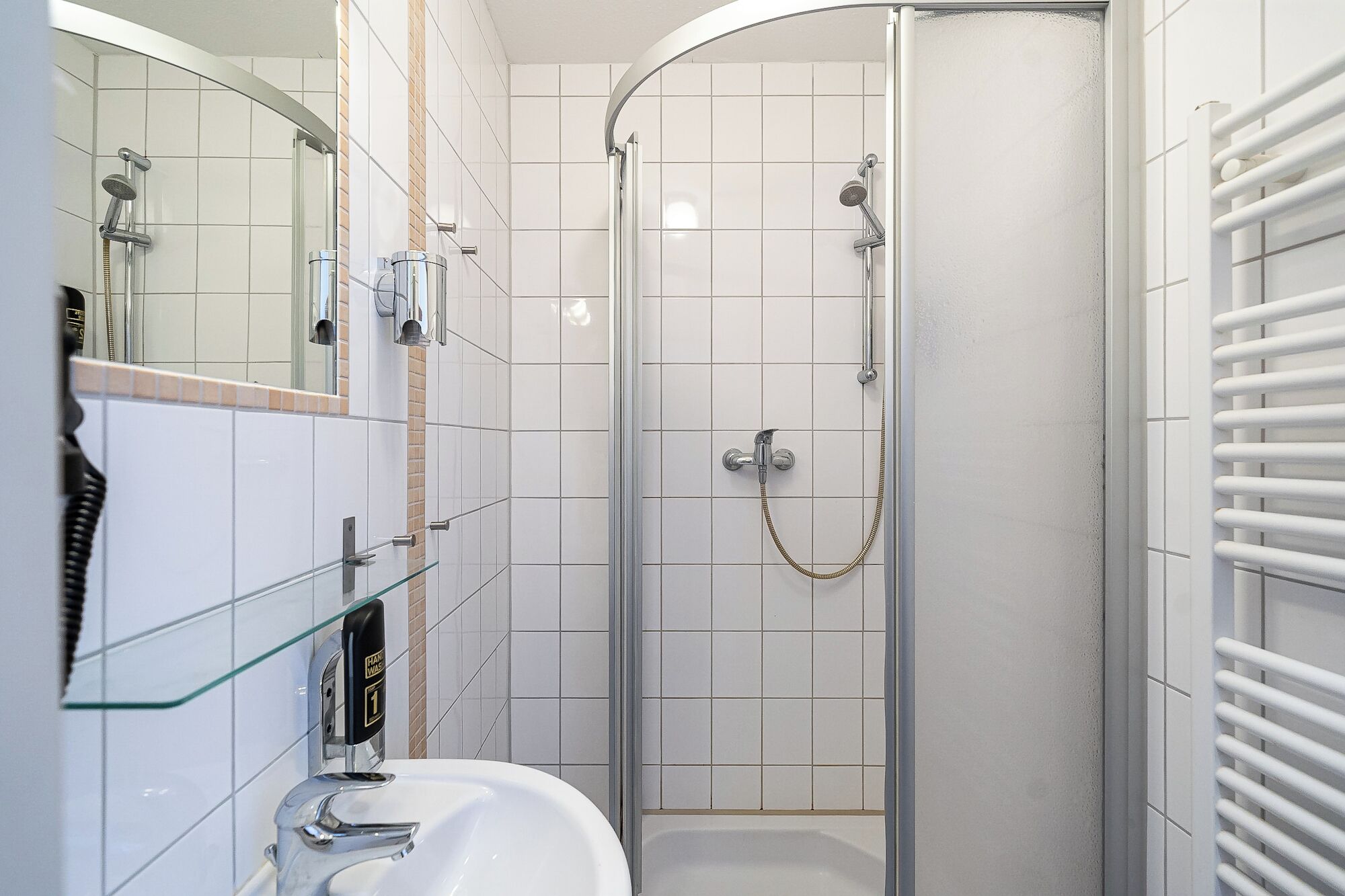 standard single room | bathroom | shower, hair dryer, towels