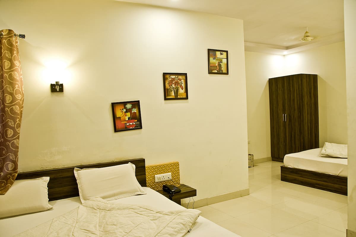 Quarto família | Individualmente decorados, individualmente mobiliados