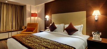 Ropa de cama de alta calidad y minibar 