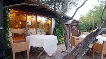 Breakfast, lunch, dinner served; Regional cuisine, garden views