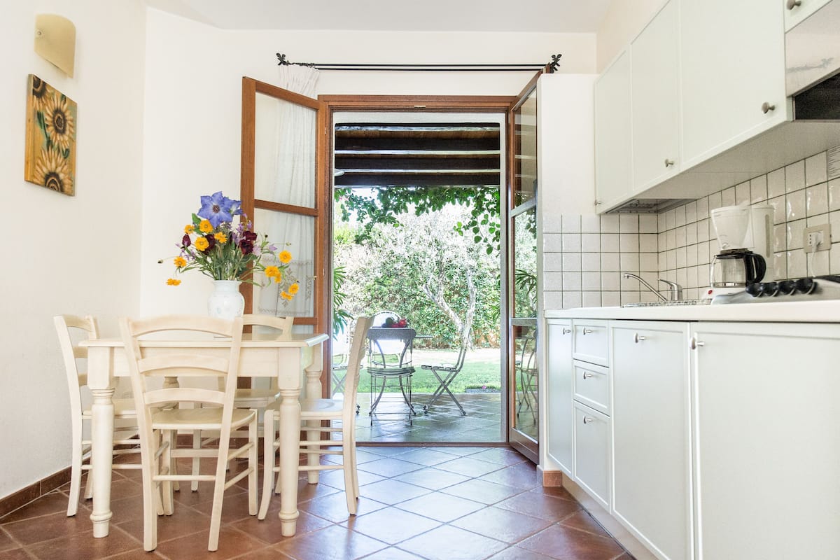 Departamento, 1 habitación | Cocina privada | Parrilla de estufa y utensilios de cocina
