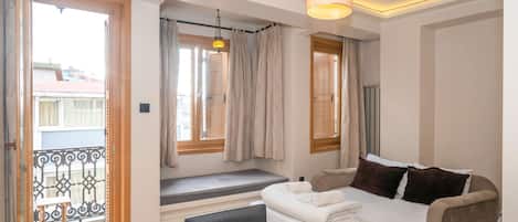 Superior Apartment | Living area | 42-inch LED TV with satellite channels, TV