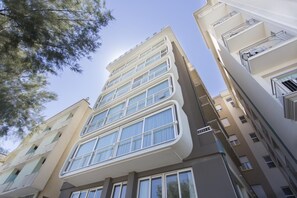 A multi-story building with balconies and large windows. - Hotel Excelsior (Gabicce Mare)
