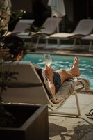 Outdoor pool, pool umbrellas, sun loungers