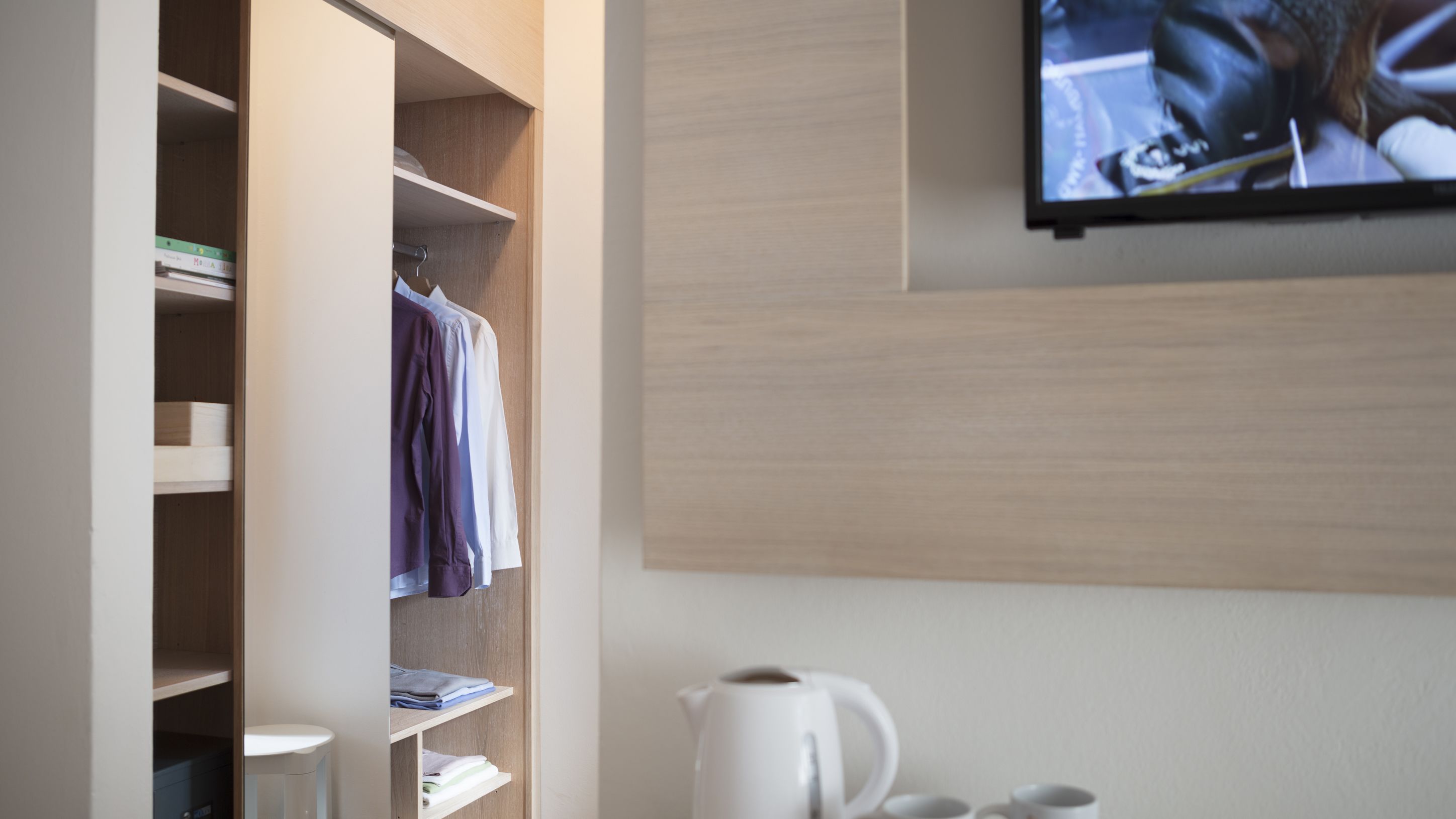 double room, balcony | in-room safe, desk, iron/ironing board, cots/infant beds