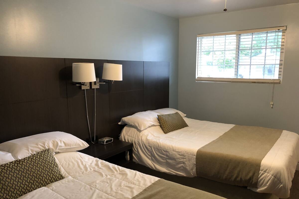 Economy Room, 2 Double Beds | Memory foam beds, iron/ironing board (on request), WiFi (free)