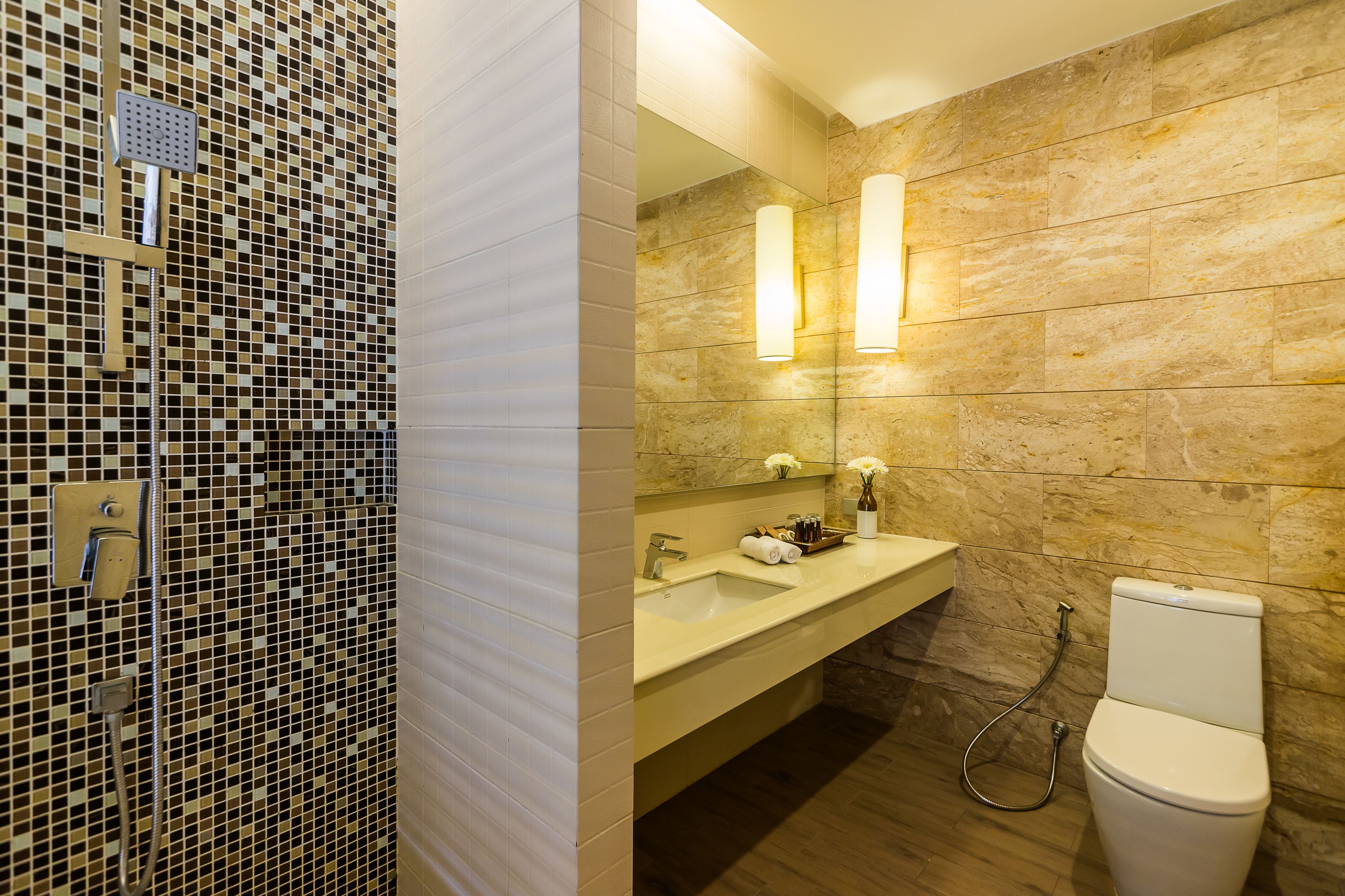 pool view deluxe king plus | bathroom | designer toiletries, hair dryer, bathrobes, slippers