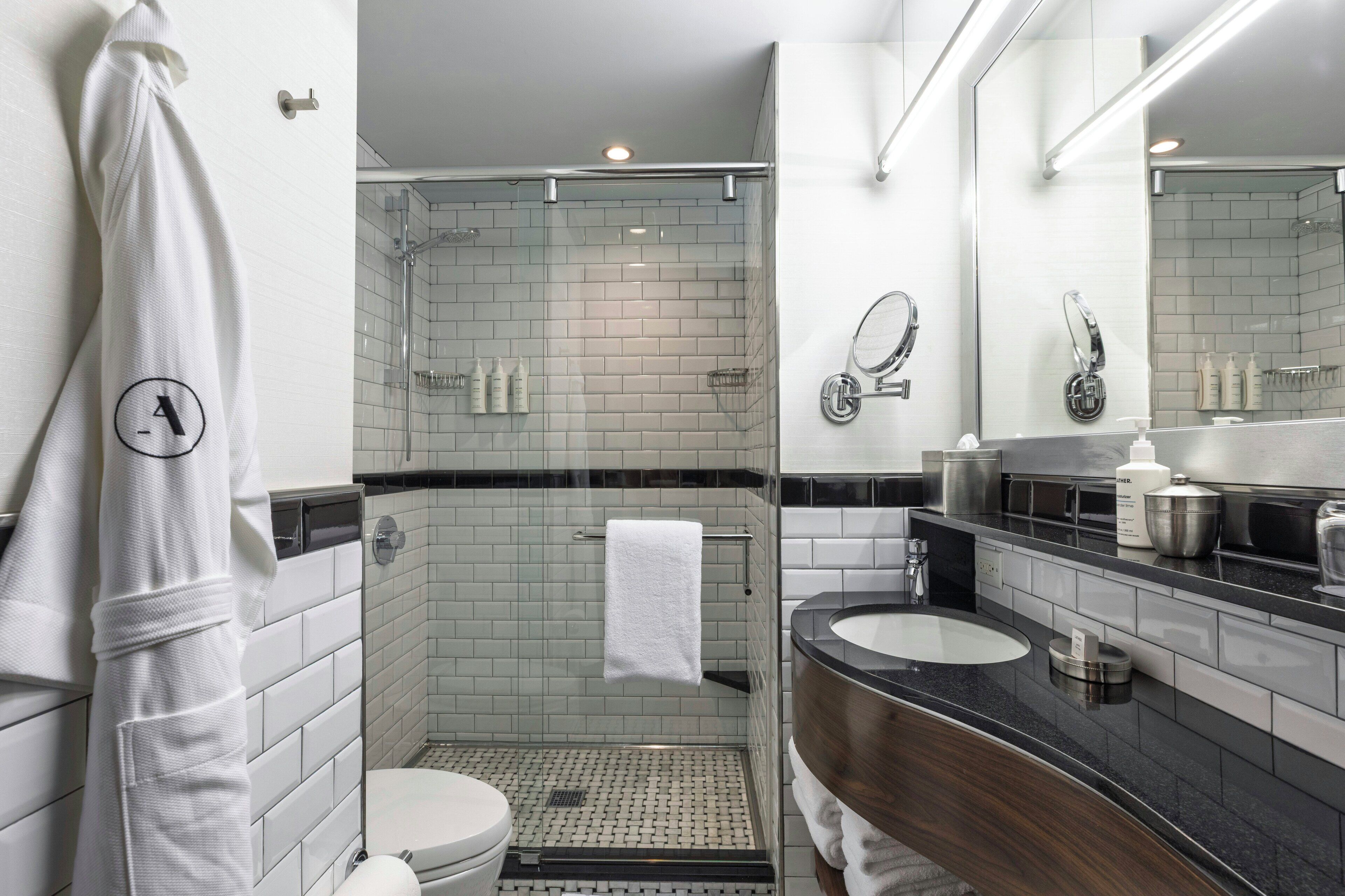 Designer toiletries, hair dryer, bathrobes, slippers