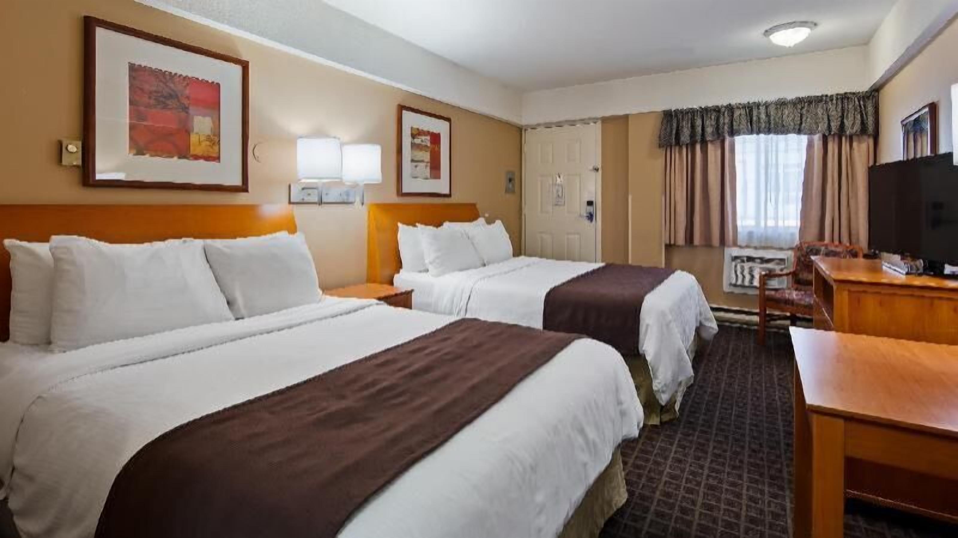 Individually furnished, desk, laptop workspace, iron/ironing board