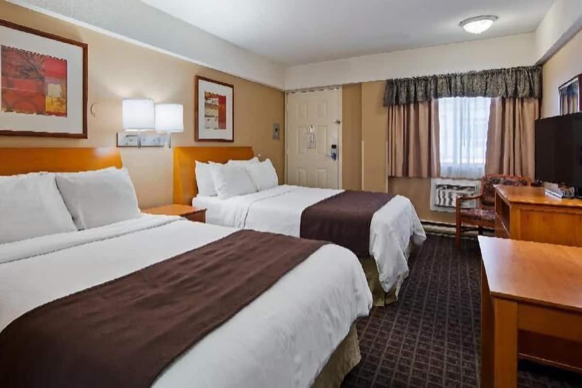 Individually furnished, desk, laptop workspace, iron/ironing board