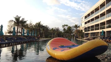Outdoor pool, open 7 AM to 7 PM, pool umbrellas, sun loungers