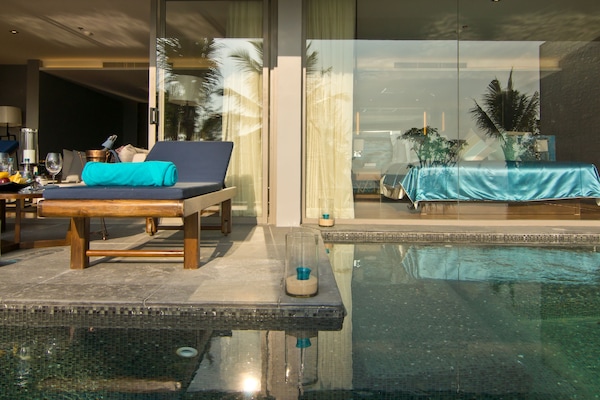 Outdoor pool, open 7 AM to 7 PM, pool umbrellas, sun loungers