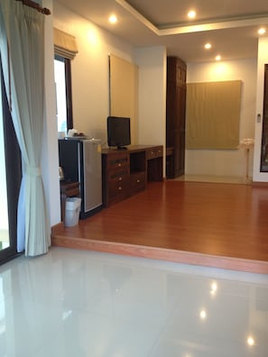 Standard Villa | Living area | 32-inch LCD TV with satellite channels, TV