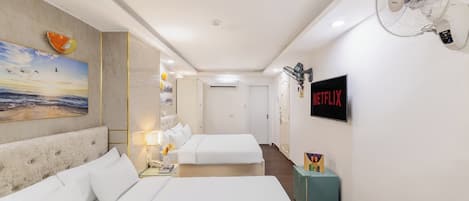 Family Room | Minibar, in-room safe, iron/ironing board, free WiFi