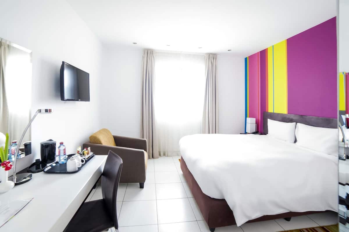 Suite Junior | Literie de qualité supérieure, coffres-forts dans les chambres, bureau