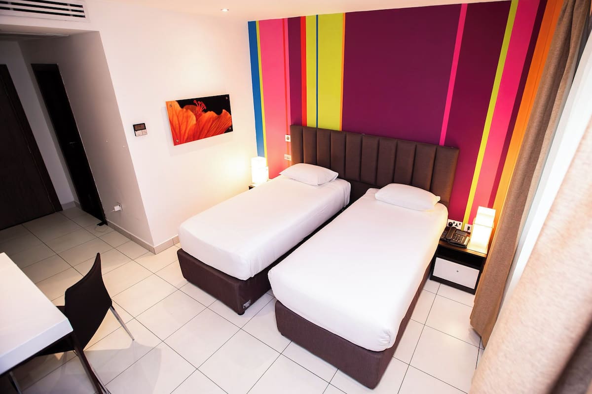 Twin Room, 2 Single Beds | Premium bedding, in-room safe, desk, laptop workspace