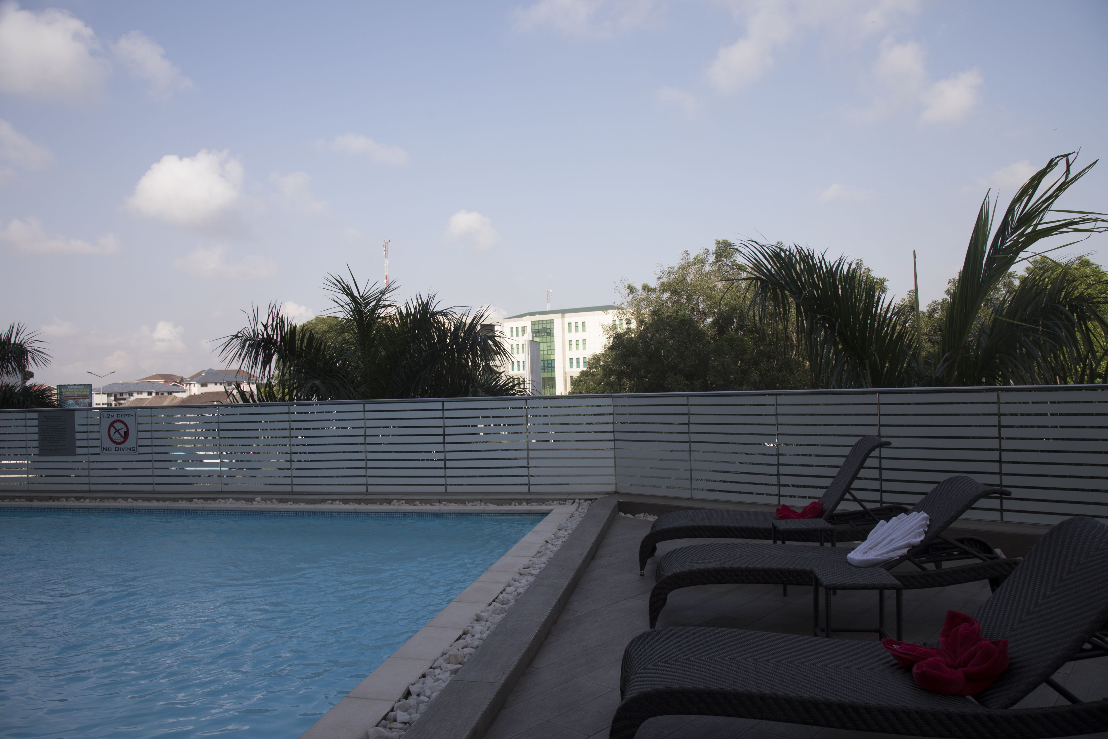 outdoor pool, pool loungers