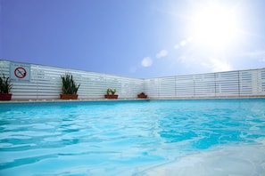 Outdoor pool, sun loungers