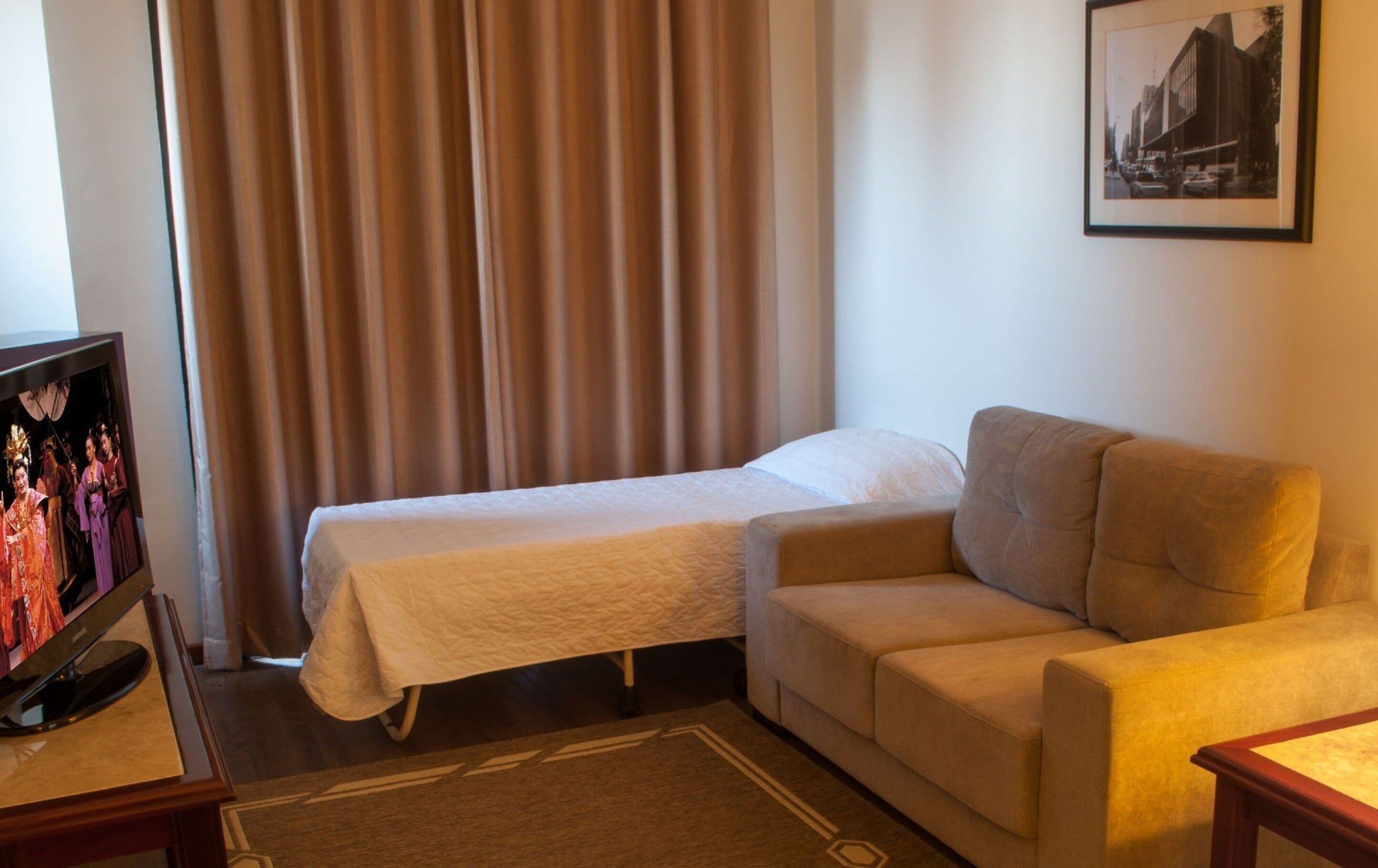 apartamento 2 camas solteiro | living room | lcd tv