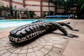 Outdoor pool, open 8 AM to 6 PM, pool loungers - Kenya Comfort Suites (Nairobi)