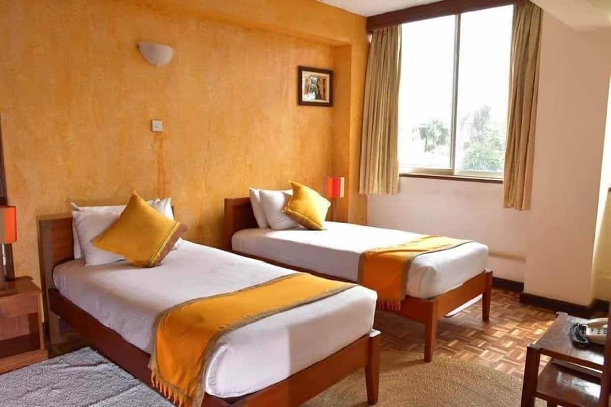 Suite, 1 slaapkamer | 1 slaapkamer, een bureau, een laptopwerkplek, verduisterende gordijnen