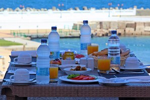Daily buffet breakfast (USD 12 per person)