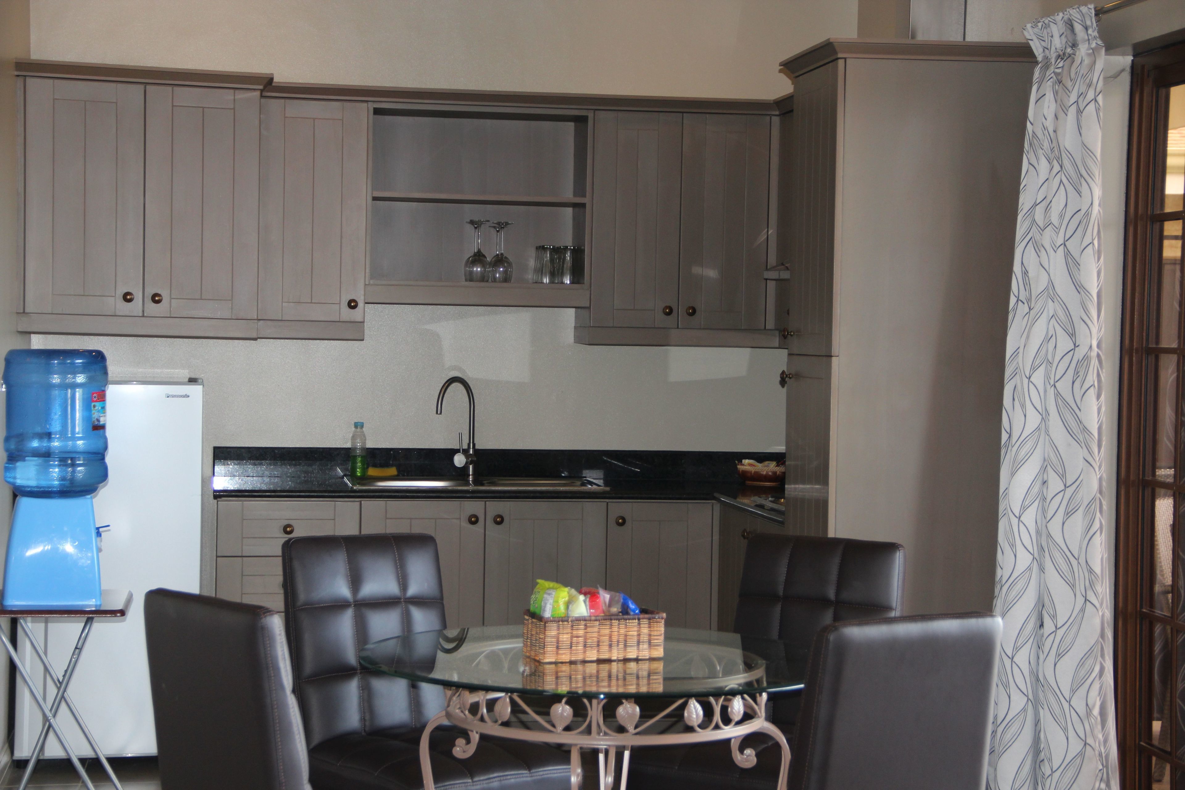 apartment garden view | in-room safe, desk, free cots/infant beds, rollaway beds