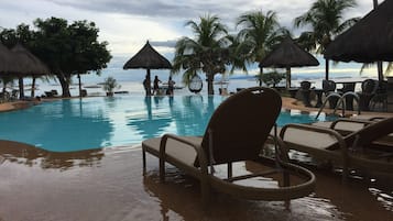 Outdoor pool, pool umbrellas, sun loungers