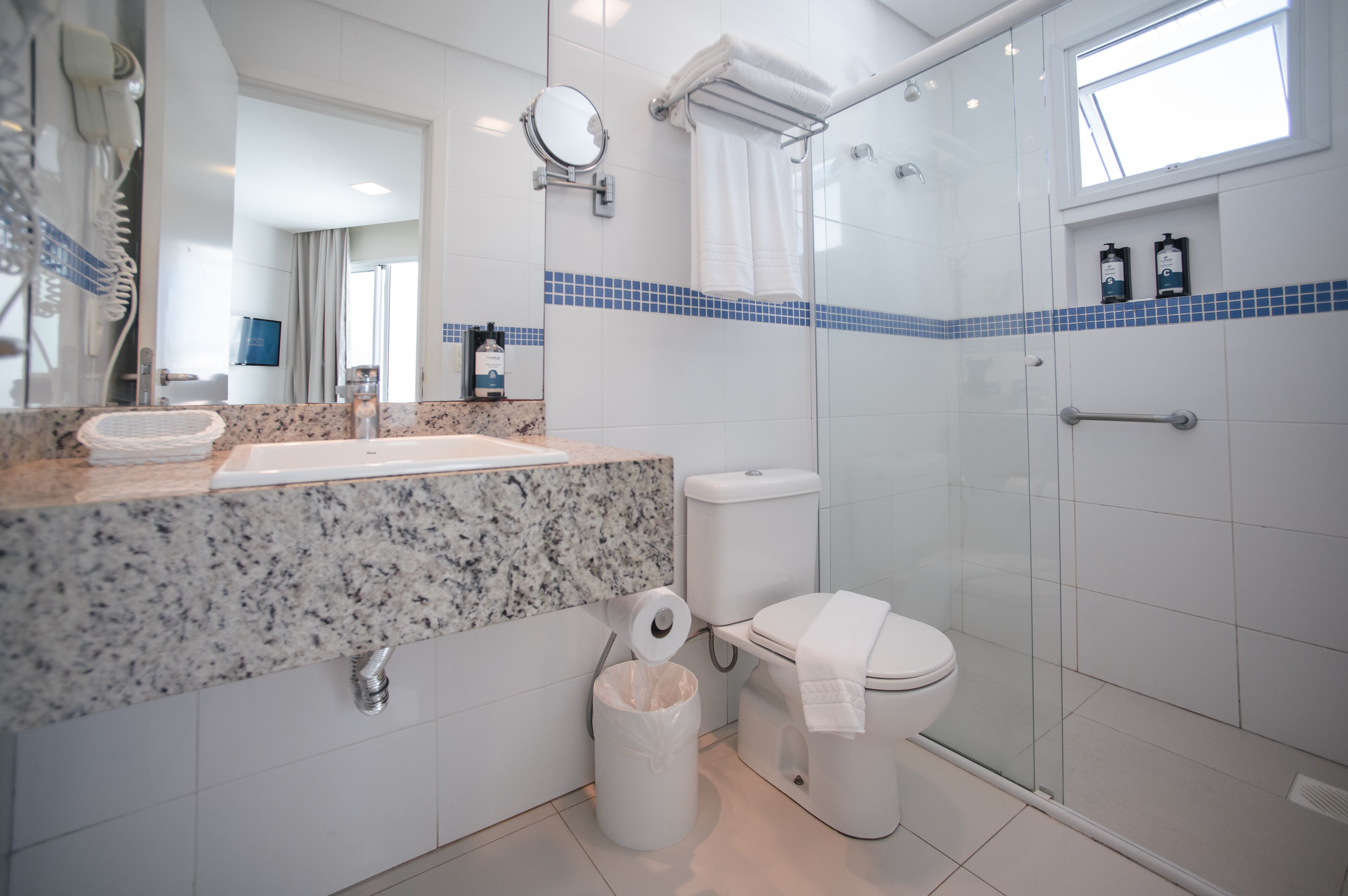 superior triple room | bathroom | shower, hair dryer, towels