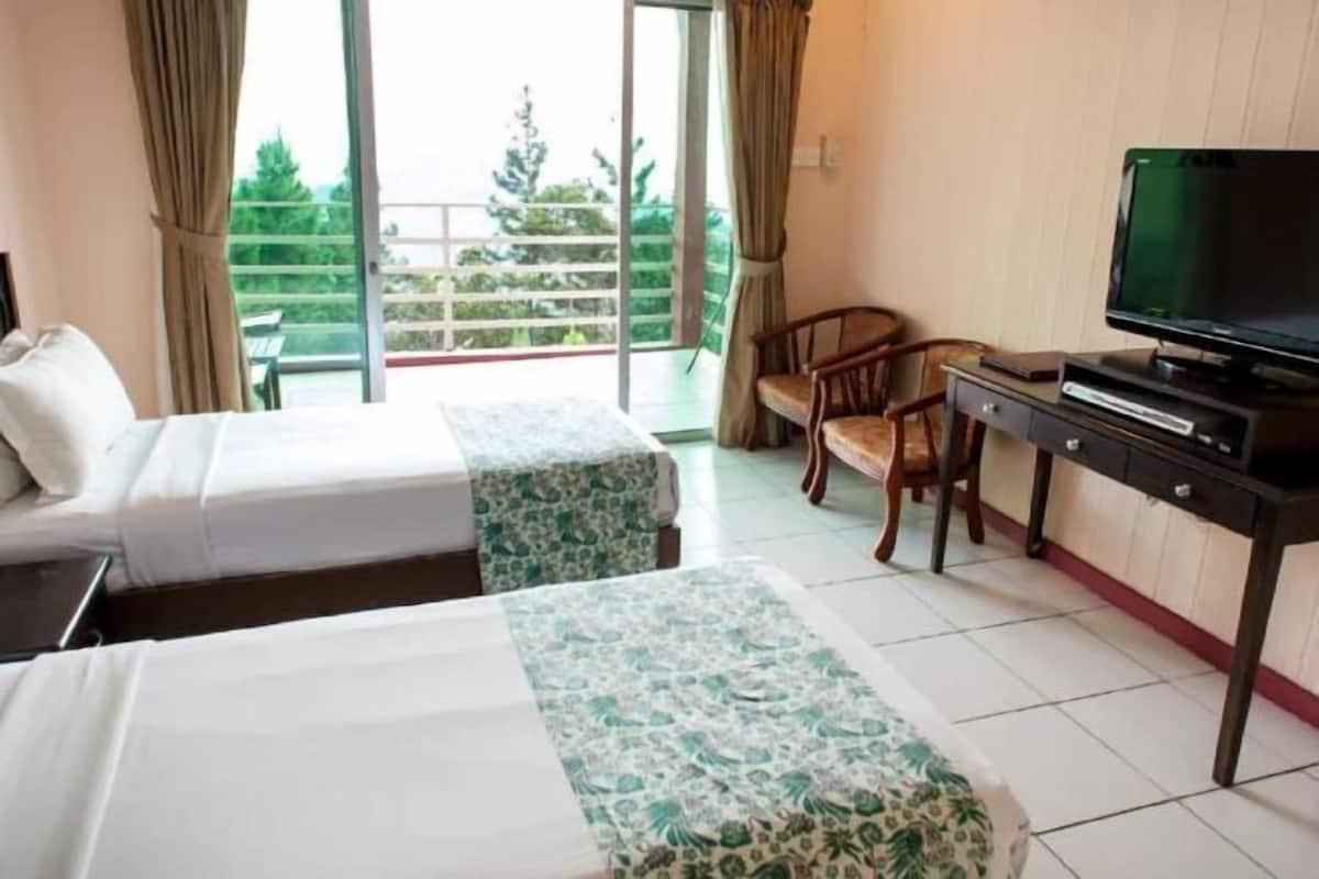 Desk, iron/ironing board, bed sheets