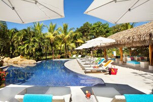 Outdoor pool, pool umbrellas, sun loungers