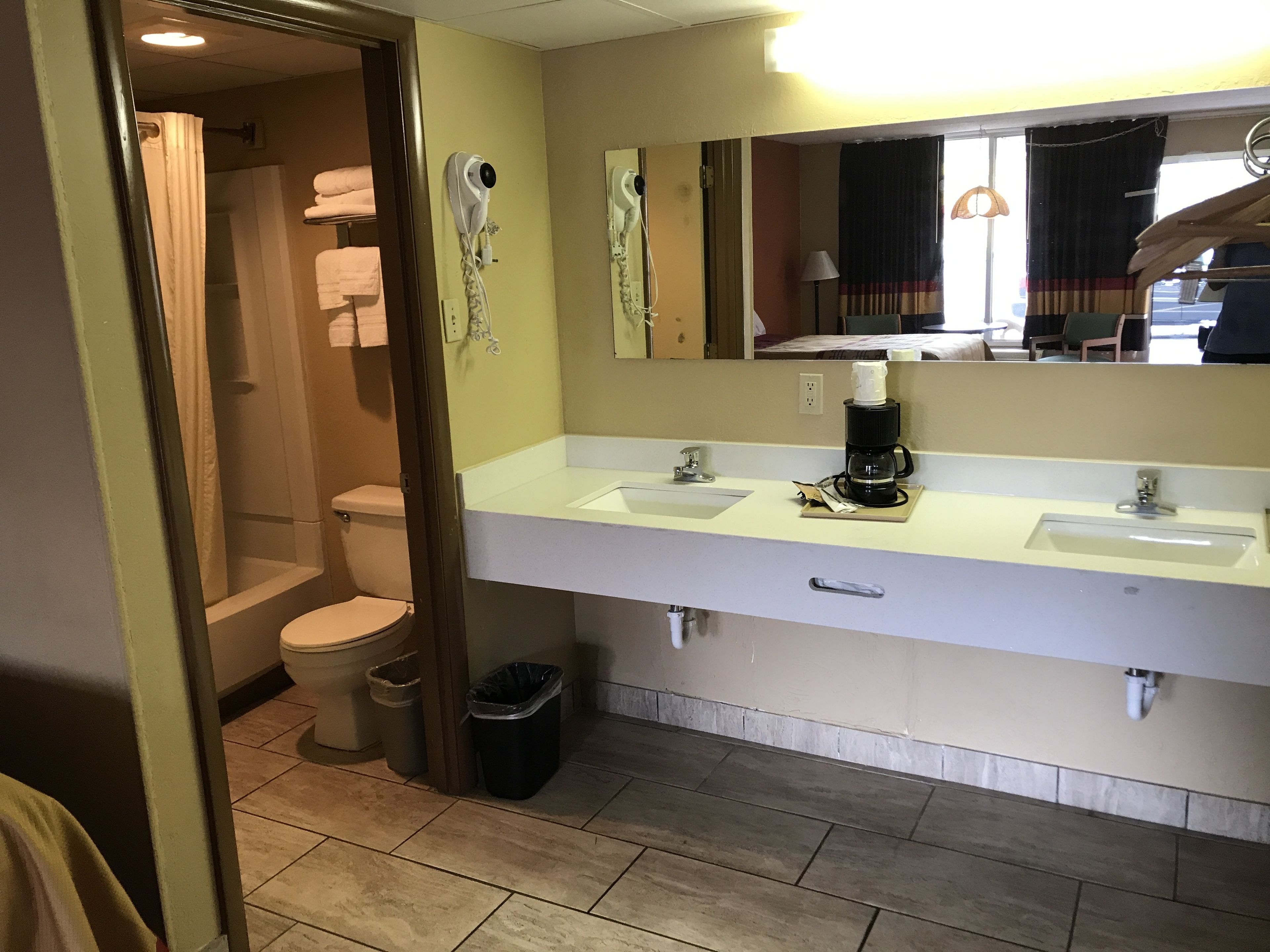 room, 2 queen beds | bathroom | combined shower/bathtub, free toiletries, hair dryer, towels
