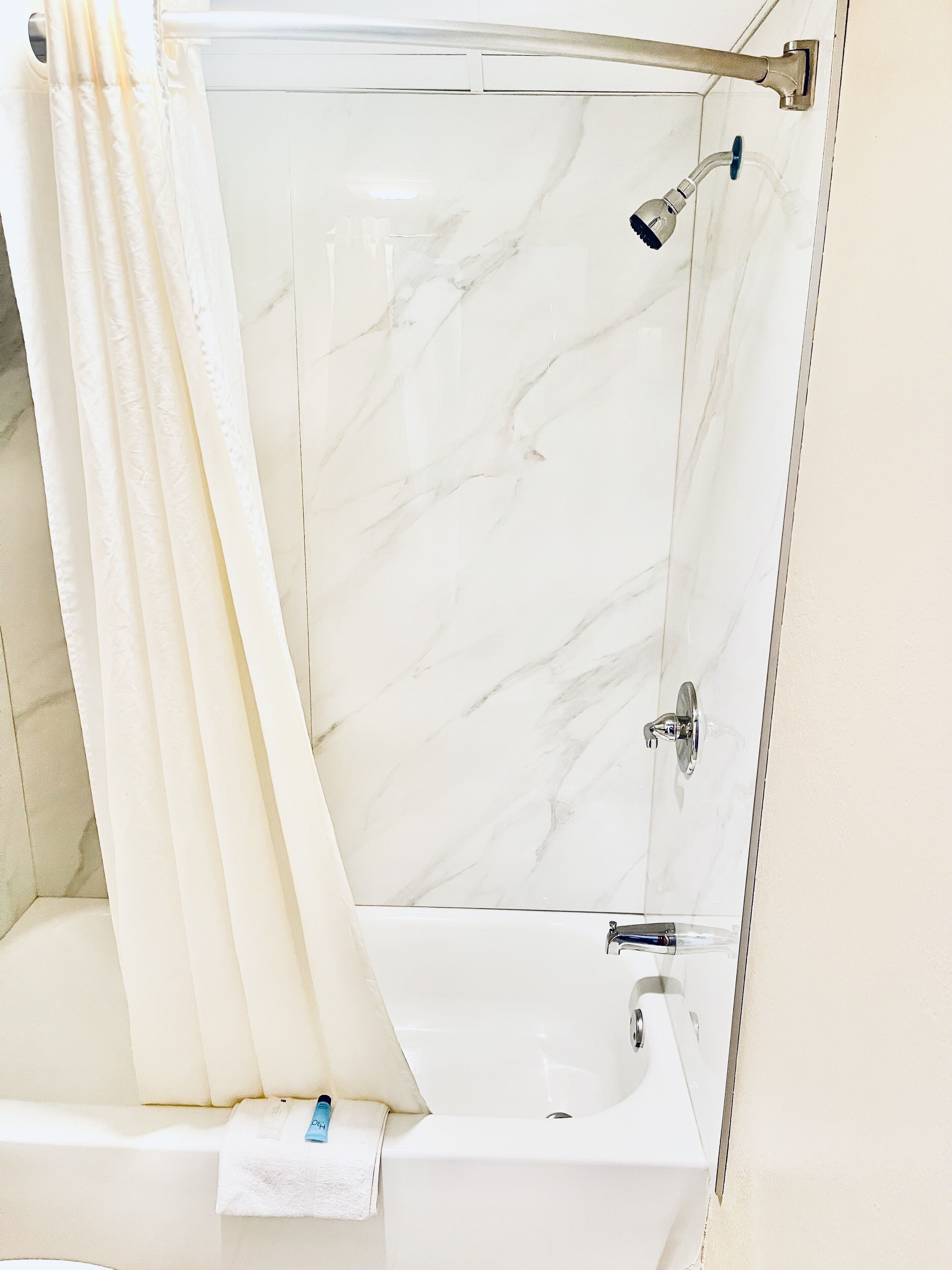 room, 2 queen beds | bathroom | combined shower/bathtub, free toiletries, hair dryer, towels