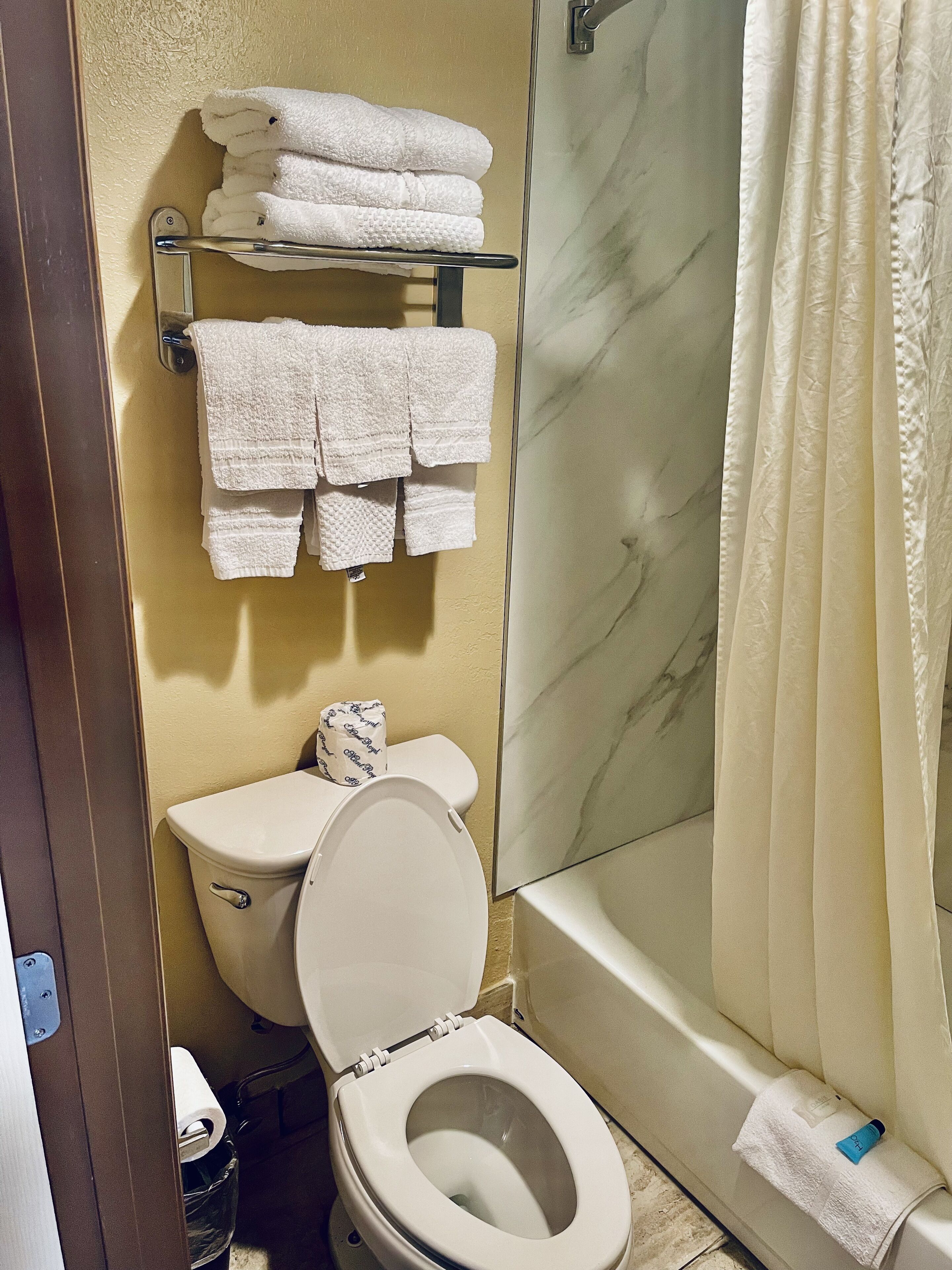 room, 2 queen beds | bathroom | combined shower/bathtub, free toiletries, hair dryer, towels