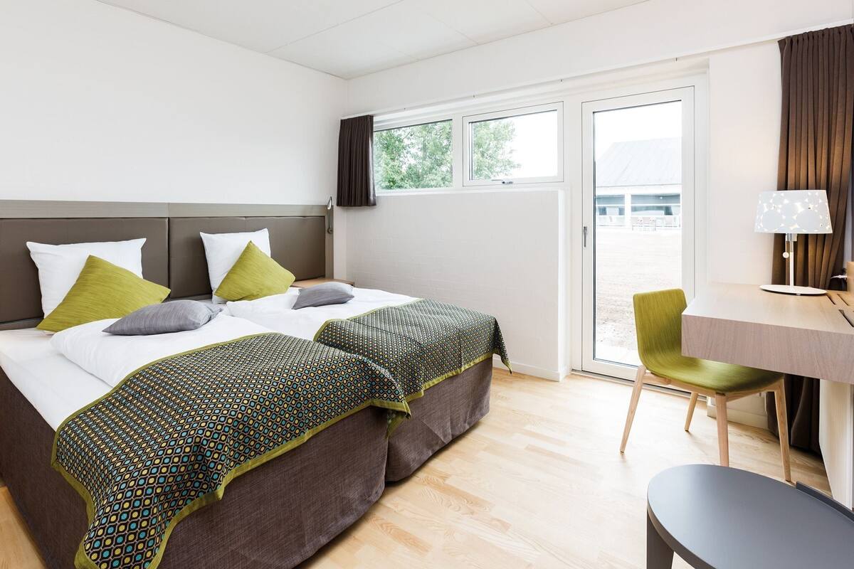 Double Room | Premium bedding, soundproofing, cribs (surcharge), WiFi (free)