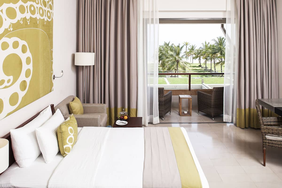 deluxe room | premium bedding, minibar, in-room safe, individually decorated